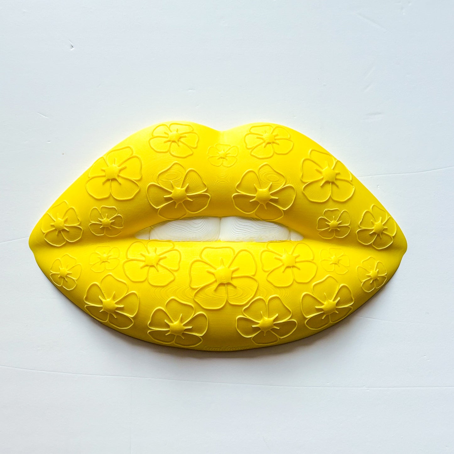 Yellow lip wall decor