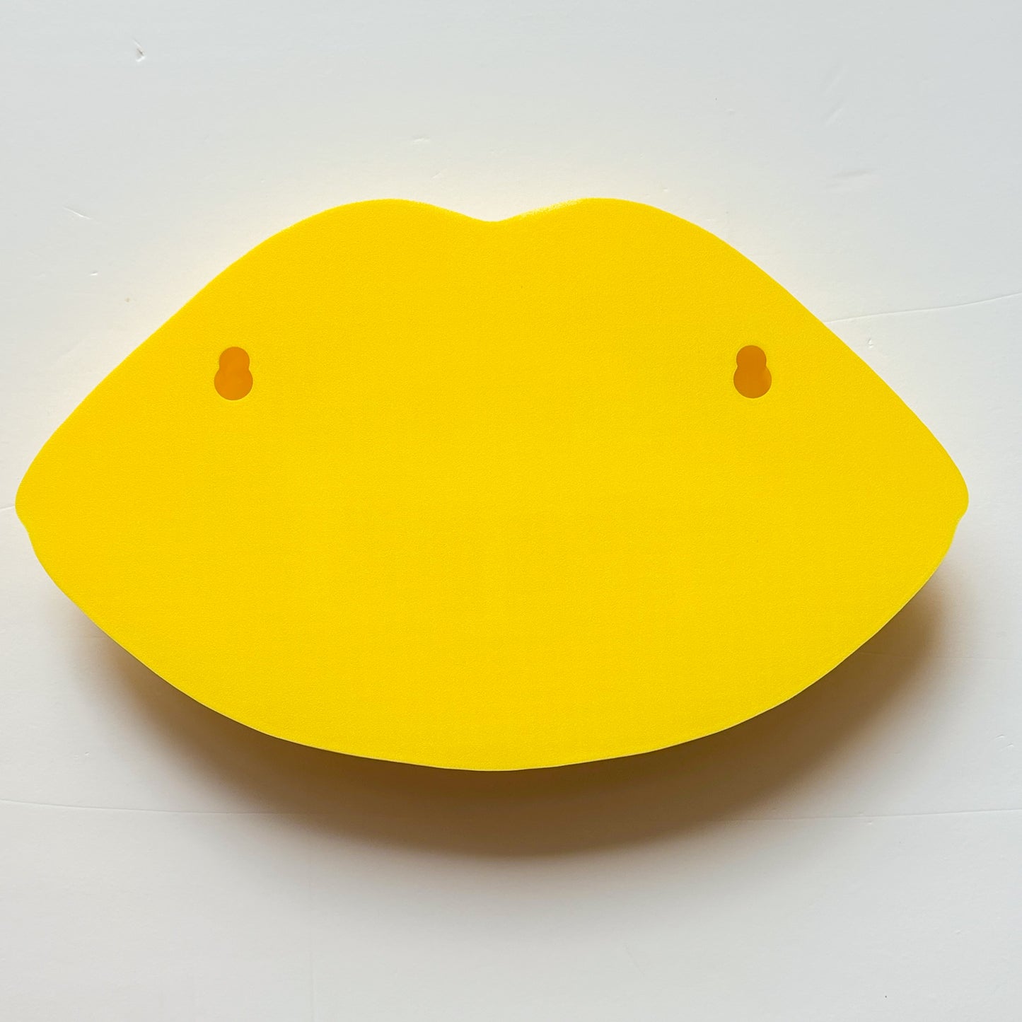 Yellow lip wall decor