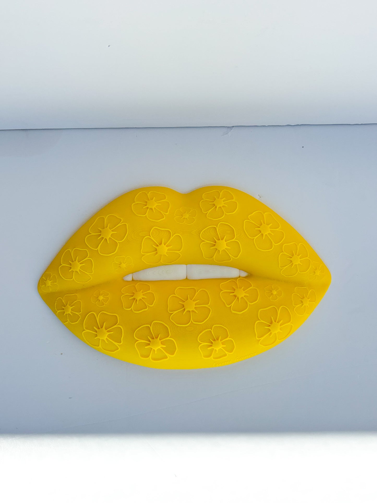 Yellow lip wall decor